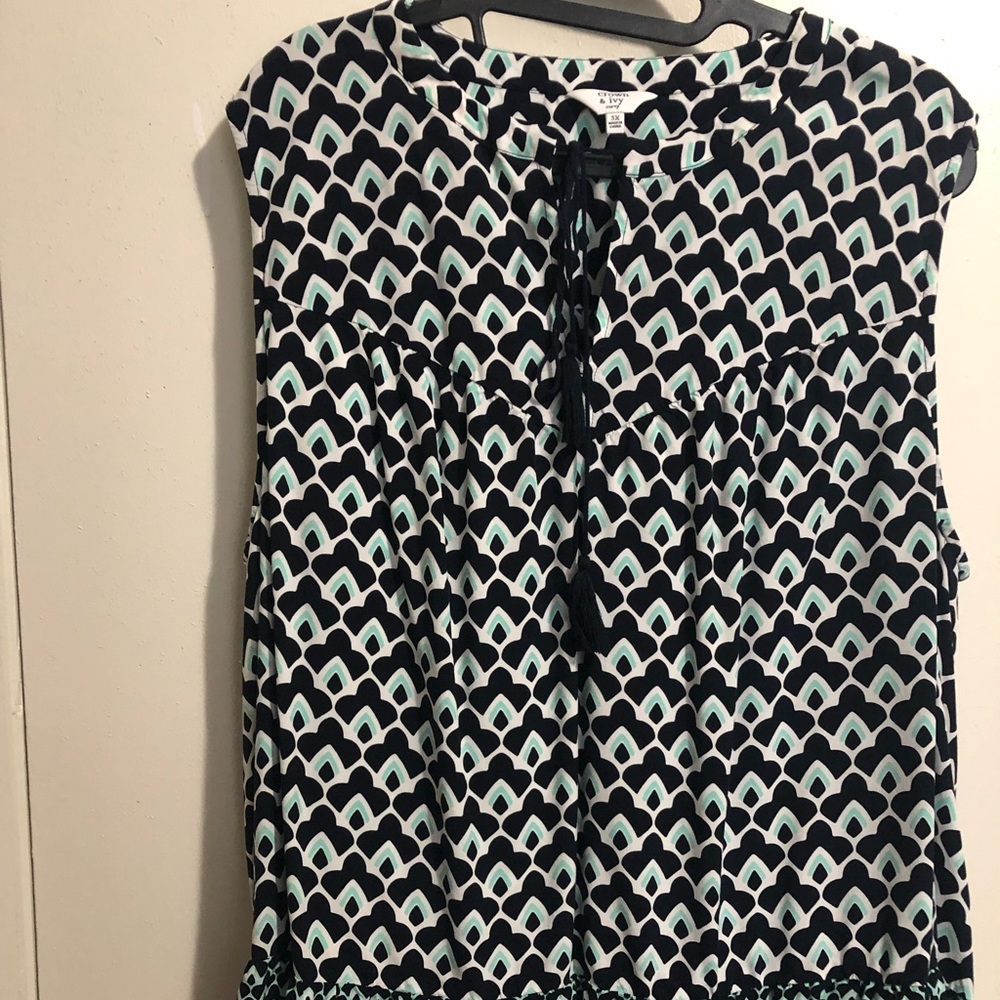 Crown & Ivy Sleeveless blouse with tassels.